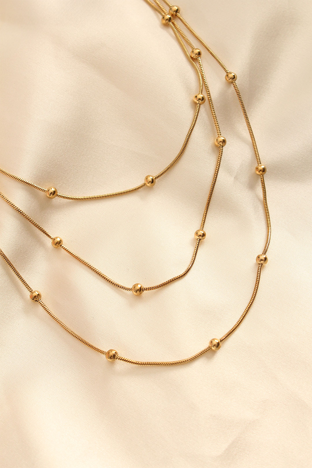 Çelik Altın Renkli Topçuk Tasarımlı Çoklu Kolye - Lisinya