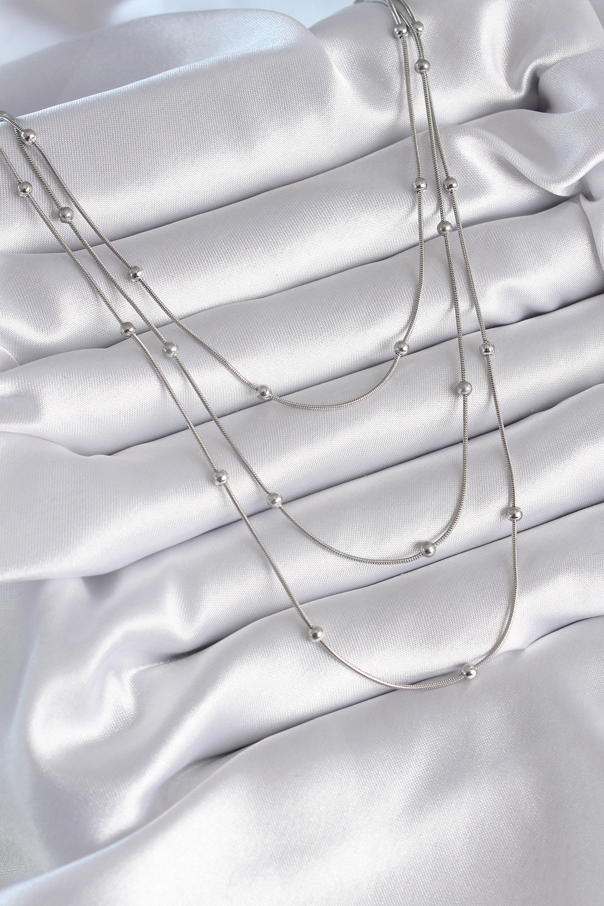 316L Çelik Gümüş Renk 3'lü Topçuk Detay Kadın Kolye - Lisinya 316L Çelik Gümüş Renk 3'lü Topçuk Detay Kadın Kolye - Lisinya