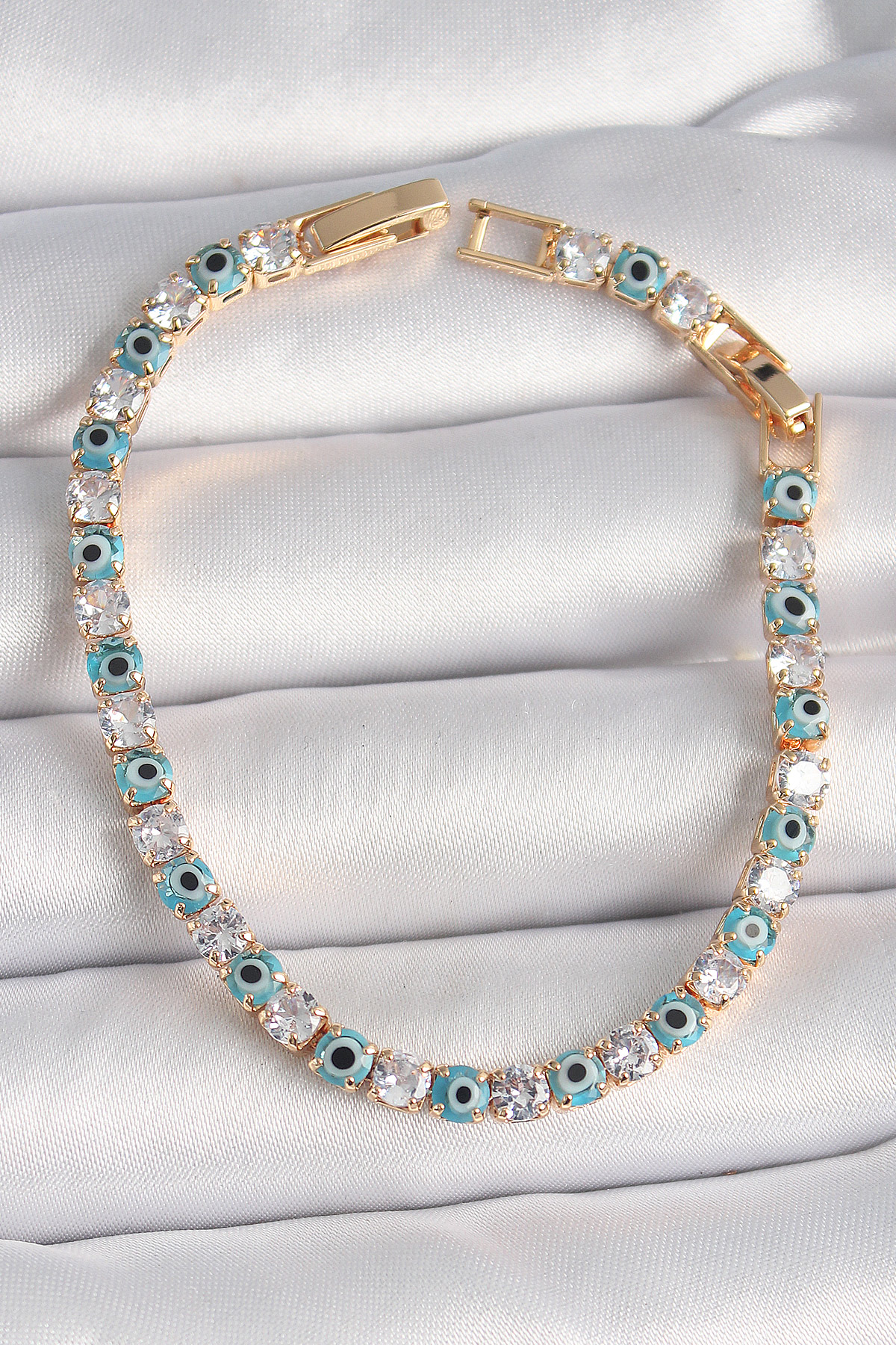 Pirinç Gold Renk Su Yolu Zirkon Taşlı Nazar Boncuklu Kadın Bileklik - Lisinya Pirinç Gold Renk Su Yolu Zirkon Taşlı Nazar Boncuklu Kadın Bileklik - Lisinya