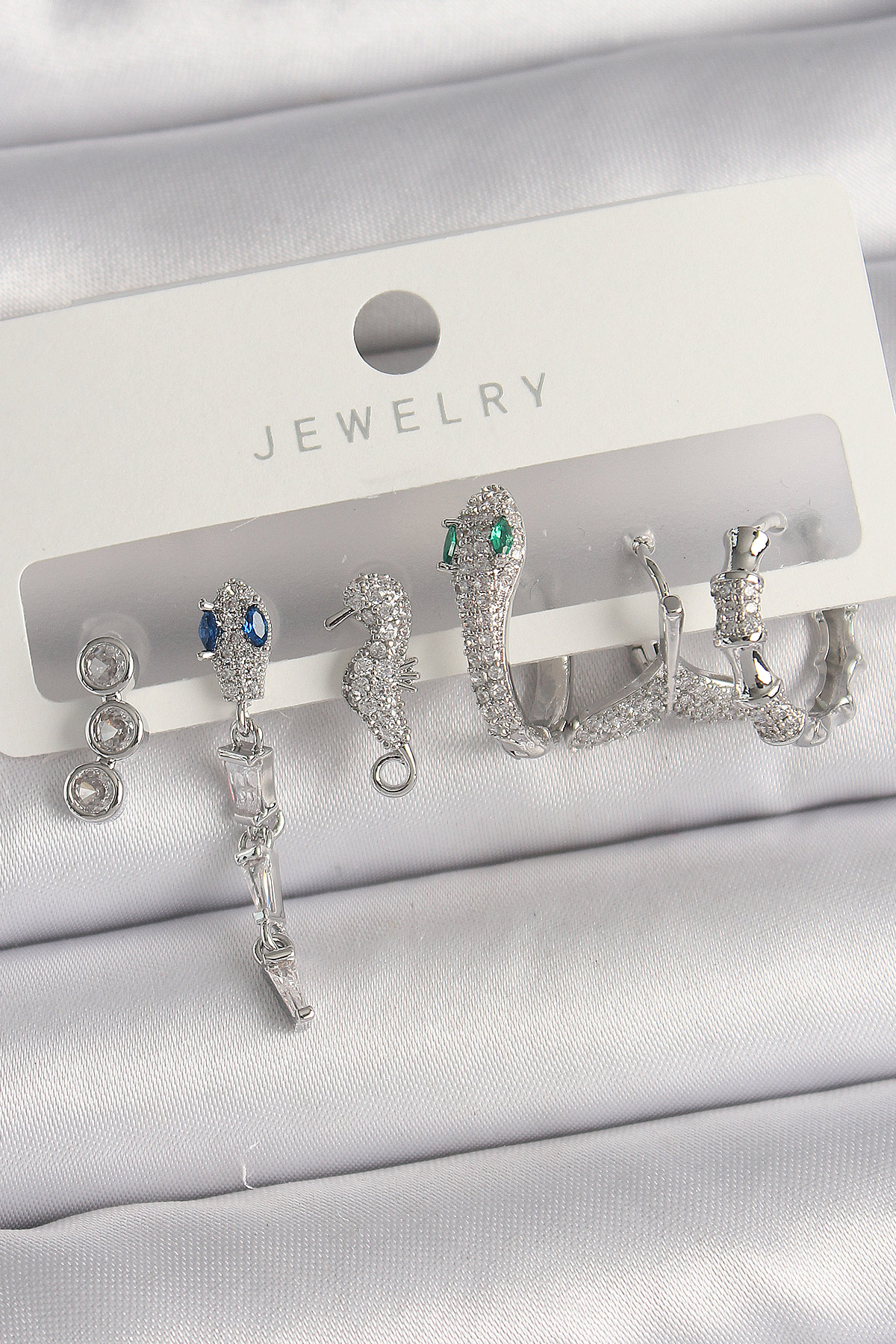 Pirinç Gümüş Renk Sallantı Zirkon Taşlı Yılan Model Kadın Küpe Seti - Lisinya Pirinç Gümüş Renk Sallantı Zirkon Taşlı Yılan Model Kadın Küpe Seti - Lisinya