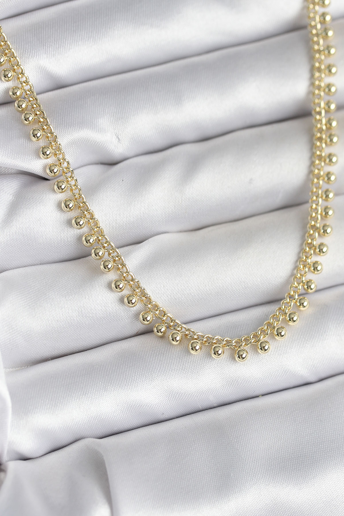 Pirinç Gold Renk Sıralı Topçuk Model Kadın Kolye - Lisinya Pirinç Gold Renk Sıralı Topçuk Model Kadın Kolye - Lisinya