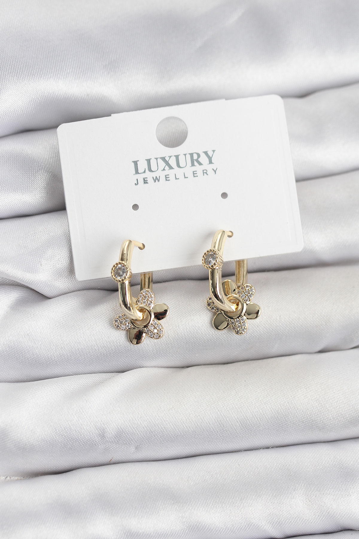 Zirkon Taşlı Pirinç Kadın Göçmen Küpesi - Lisinya Zirkon Taşlı Pirinç Kadın Göçmen Küpesi - Lisinya