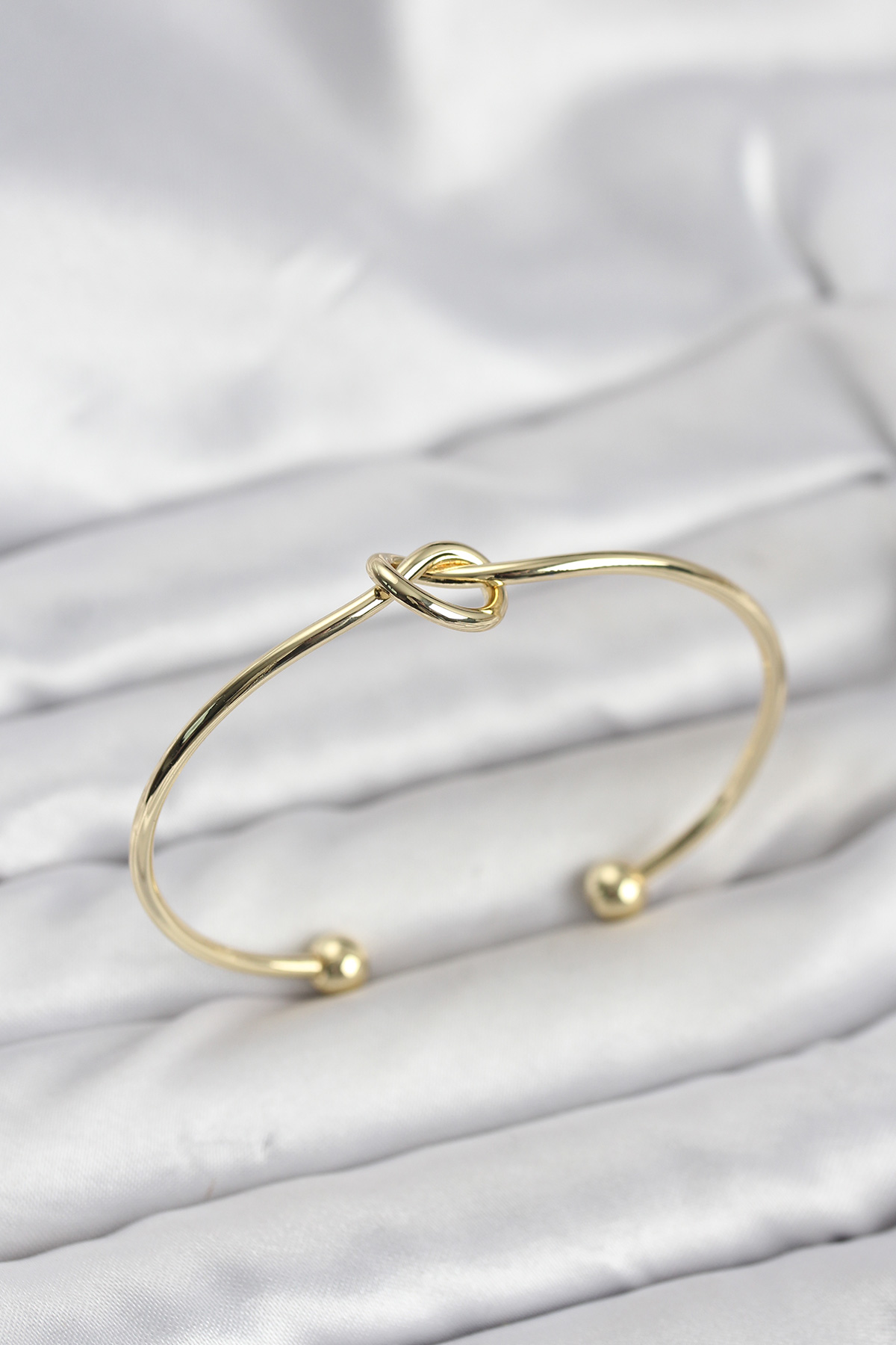 Düğüm Model Pirinç Gold Renk Kadın Bileklik - Lisinya Düğüm Model Pirinç Gold Renk Kadın Bileklik - Lisinya