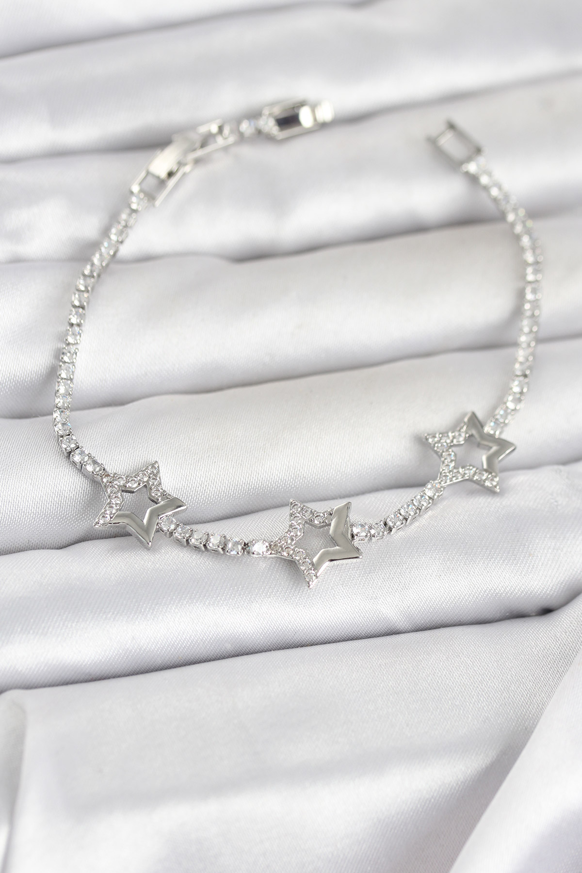 Pirinç Gümüş Renk Yıldız Model Zirkon Taşlı Su Yolu Kadın Bileklik - Lisinya