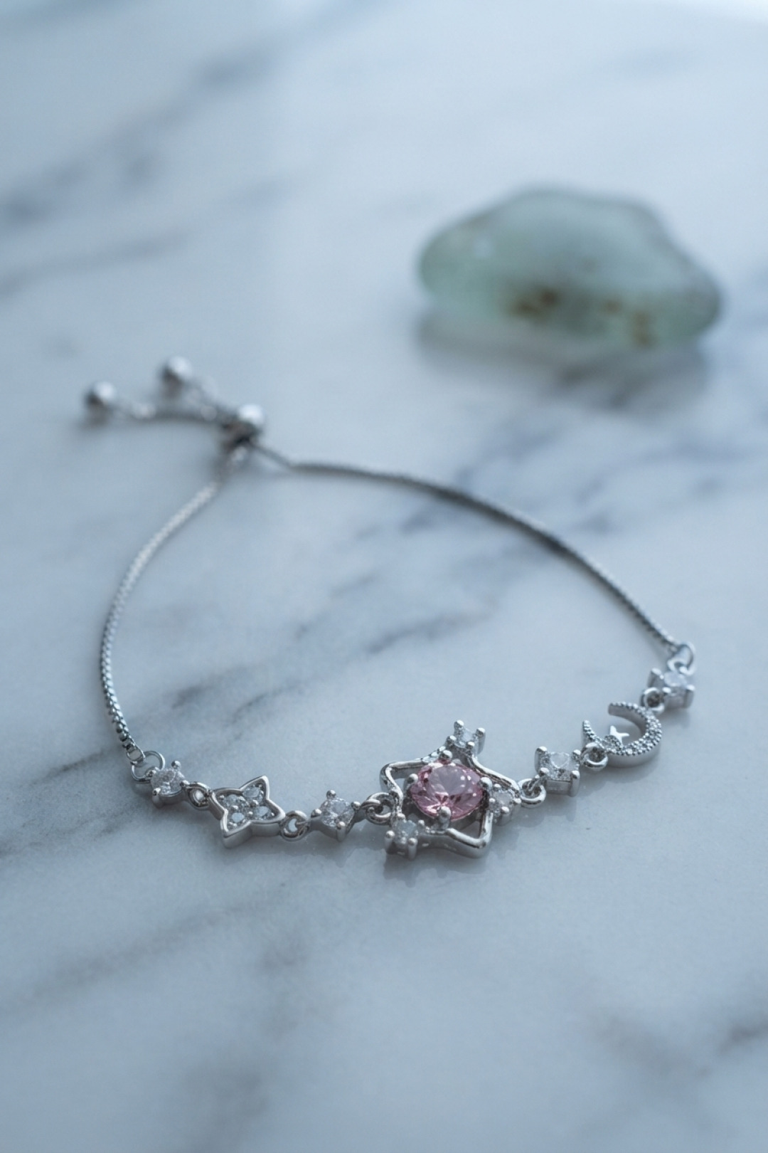 Pembe Taşlı Yıldız Model Gümüş Renk Zirkon Taşlı Asansörlü Bileklik - Lisinya