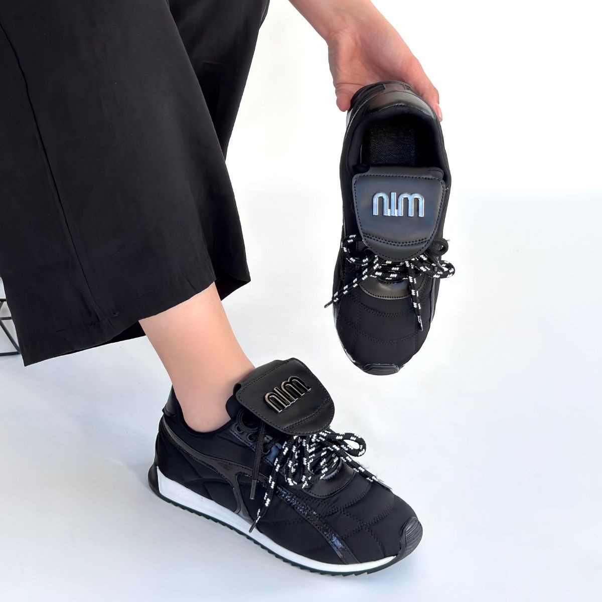 Dissa Siyah Cilt Bağcıklı Paraşüt Detaylı Spor Ayakkabı - Lisinya Dissa Siyah Cilt Bağcıklı Paraşüt Detaylı Spor Ayakkabı - Lisinya