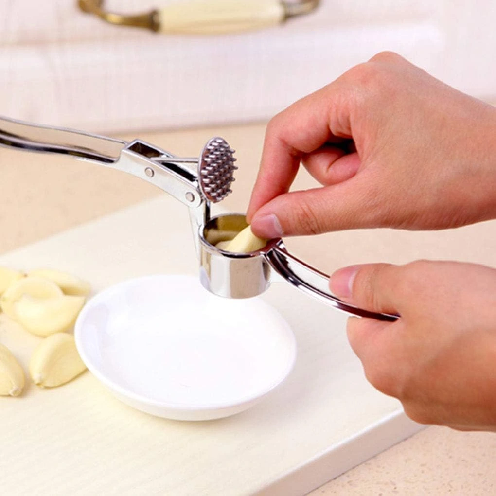 Sarımsak Ezme Aleti Rendesi ( Lisinya ) Sarımsak Ezme Aleti Rendesi ( Lisinya )