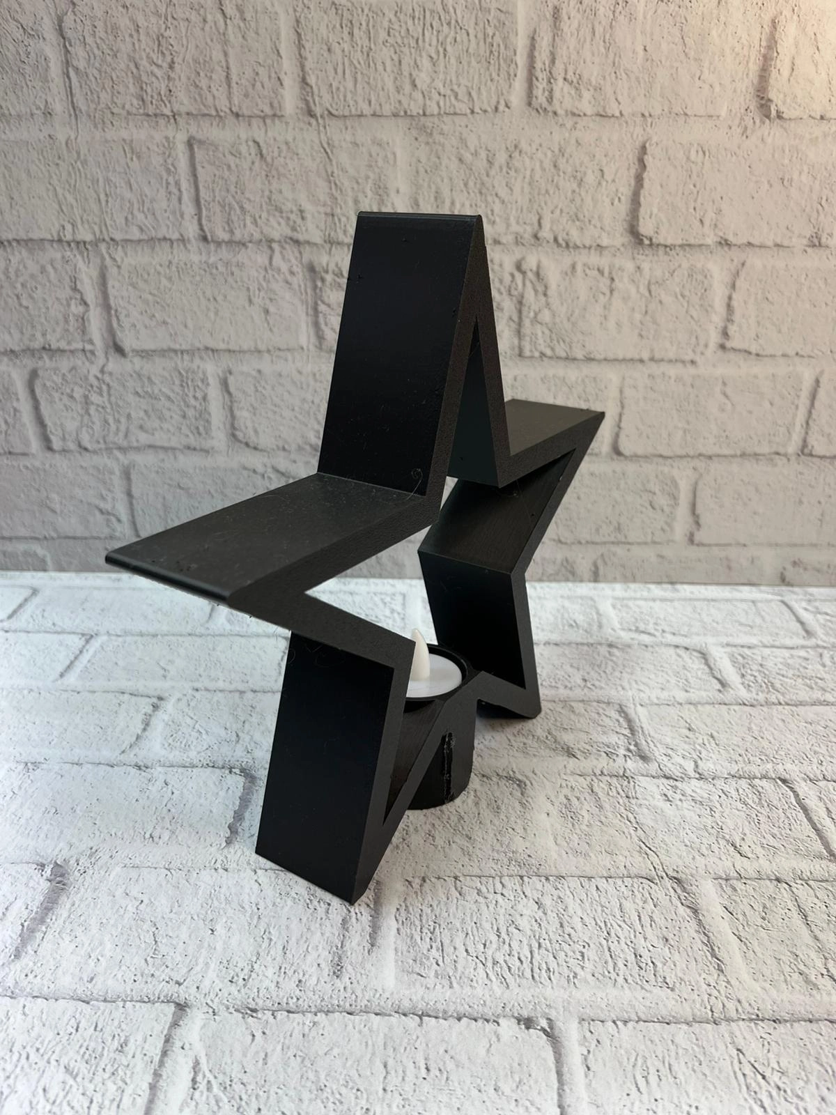 Siyah Yıldız Şeklinde Mumluk Loş Işık Dekor Aksesuarı ( Lisinya ) Siyah Yıldız Şeklinde Mumluk Loş Işık Dekor Aksesuarı ( Lisinya )