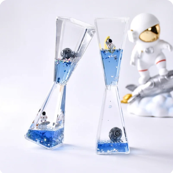 Uzay Temalı Dökülen Yağ Kum Saati ( Lisinya ) Uzay Temalı Dökülen Yağ Kum Saati ( Lisinya )