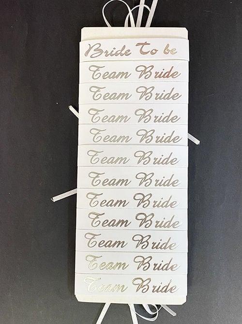 Lisinya193 Bride To Be Bileklik - Team Bride Bileklik - Beyaz Üzeri Metalize Gümüş Yazılı 12 Adet